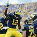 Michigan wide receiver Devin Gardner celebrates with offensive linesman Ricky Barnum after scoring a touchdown during the second half at Michigan Stadium on Saturday. Melanie Maxwell I AnnArbor.com
